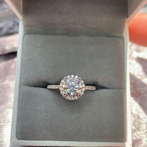 Round halo engagement moissanite bridal ring